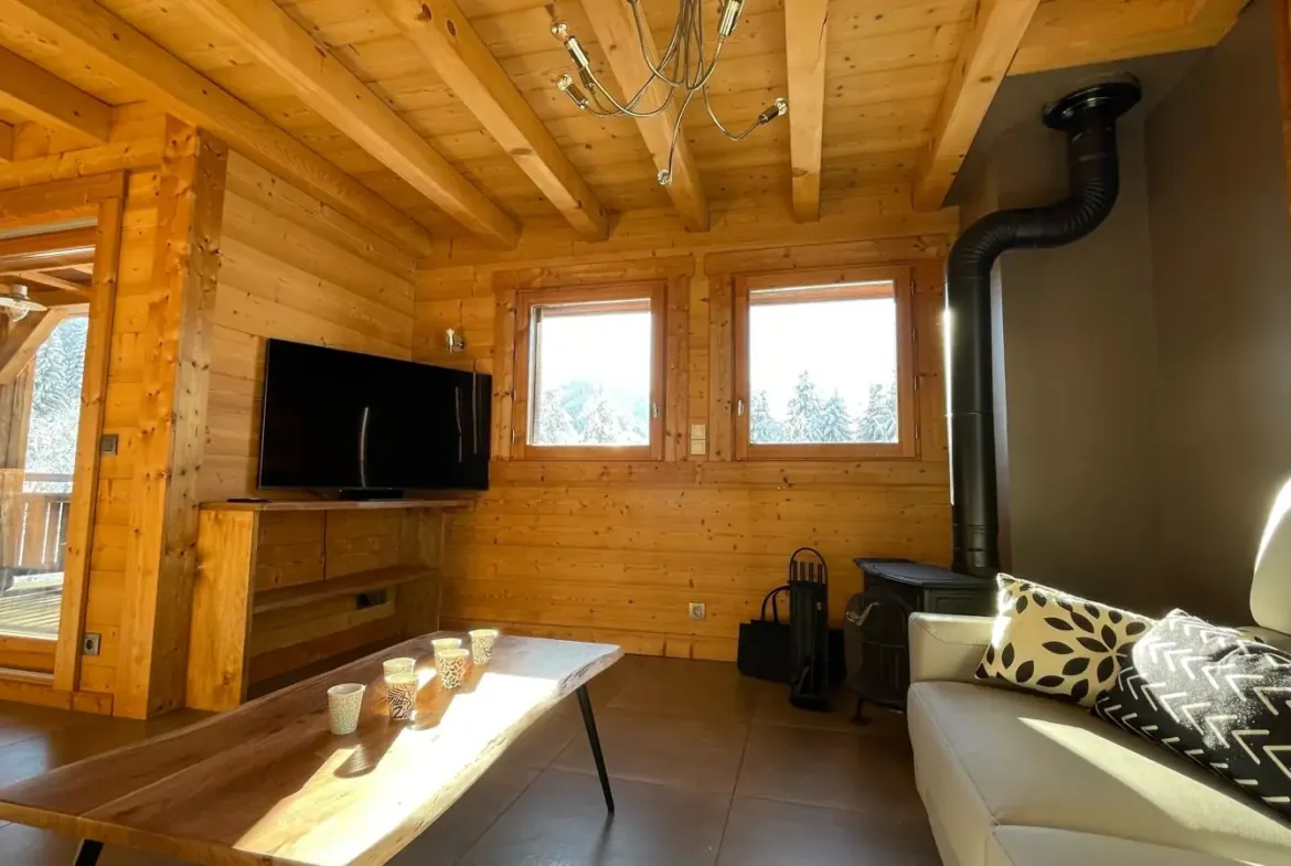 Salon avec télévision — Chalet Roc et Soleil, location saisonnière à Megève