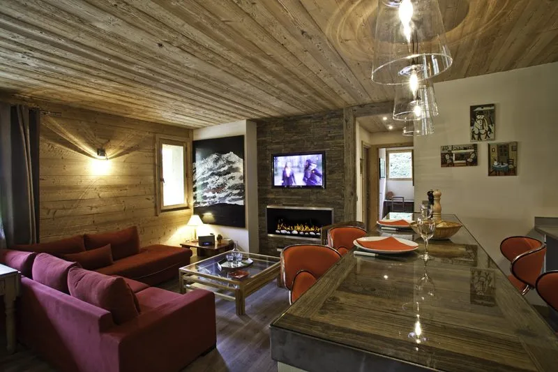 Salle à manger et salon — Appartement 1864, location saisonnière à Megève